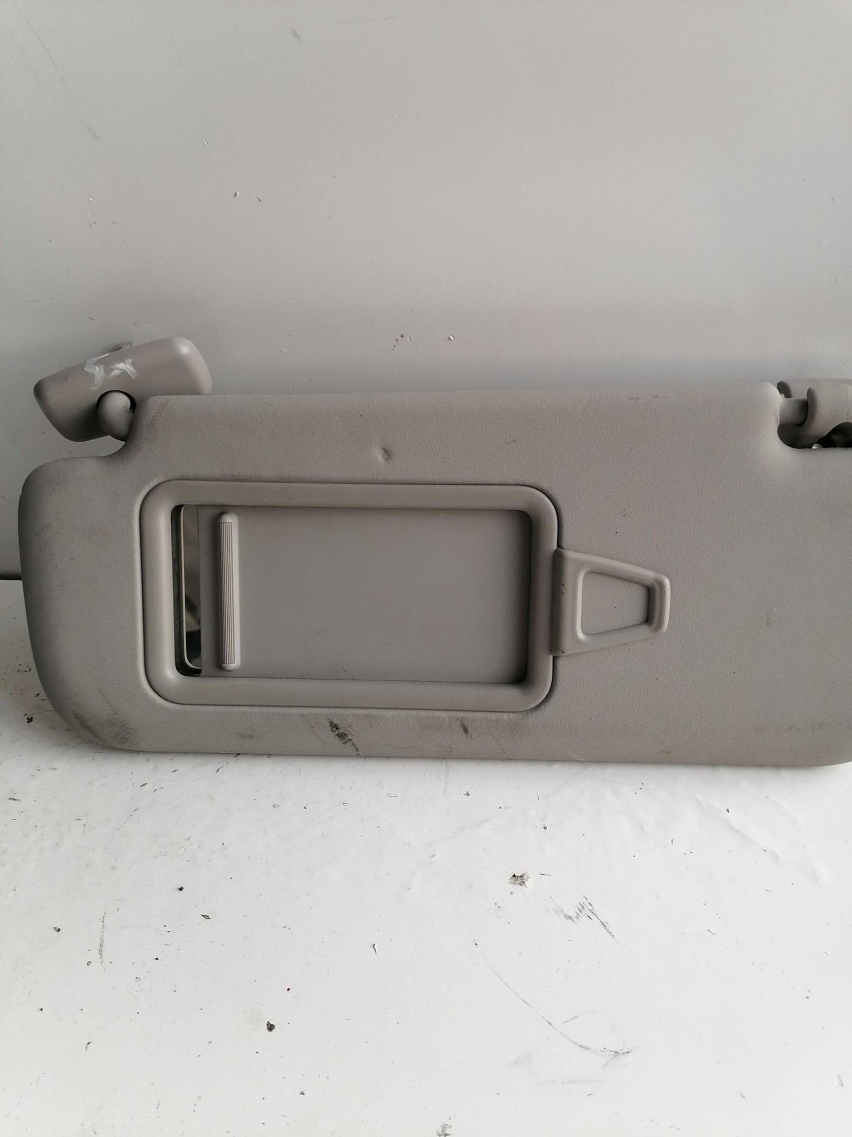 Aletta parasole parabrezza sx.